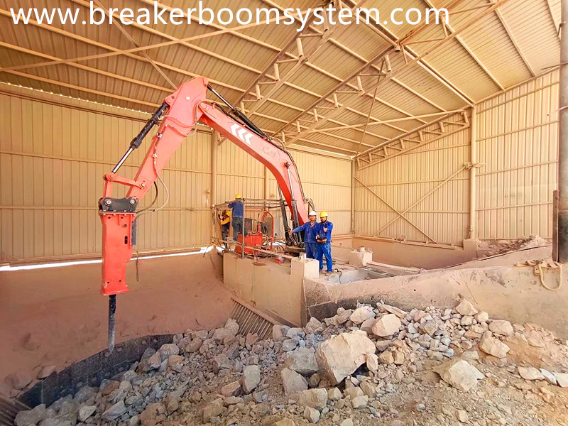 pedestal booms rock breaker system