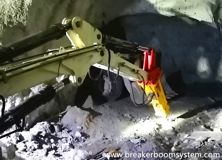 Custom Pedestal Rock Breaker Boom System Breakes Boulders In Underground Iron Mines