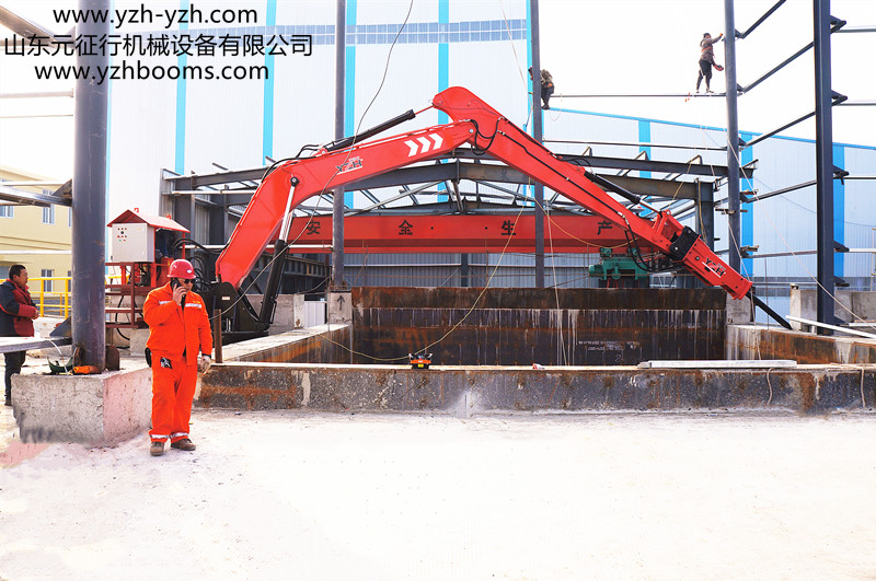 pedestal rock breaking booms system